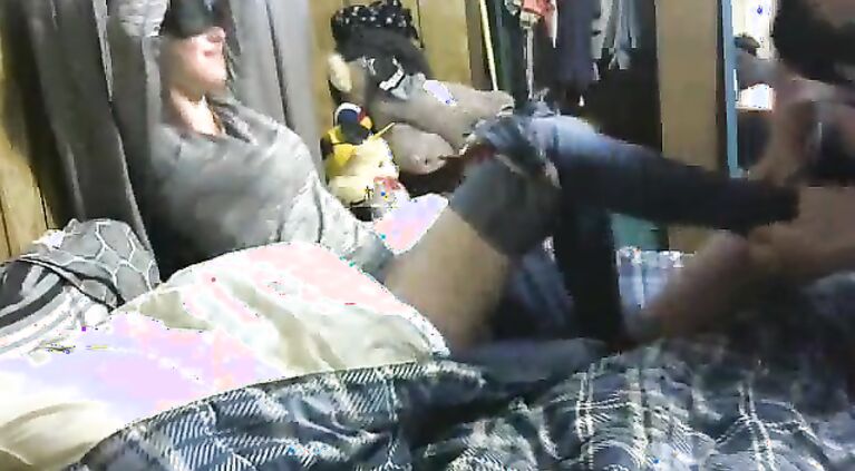 Daddy teaches young d. to check cell phone.