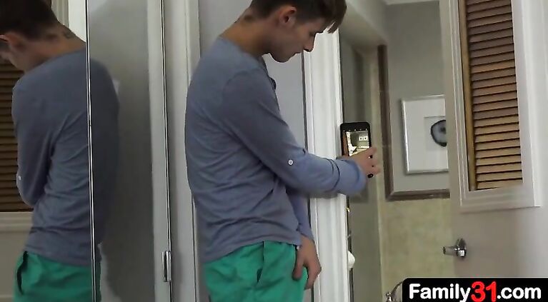 Young sexy stepson is in total awe of his beefy stepdad as he enters the house after his morning run