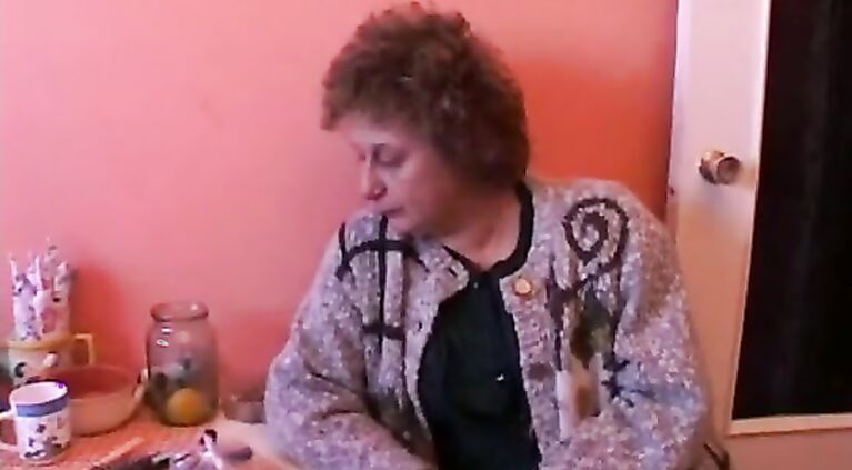 Marta surrounded with cocks
