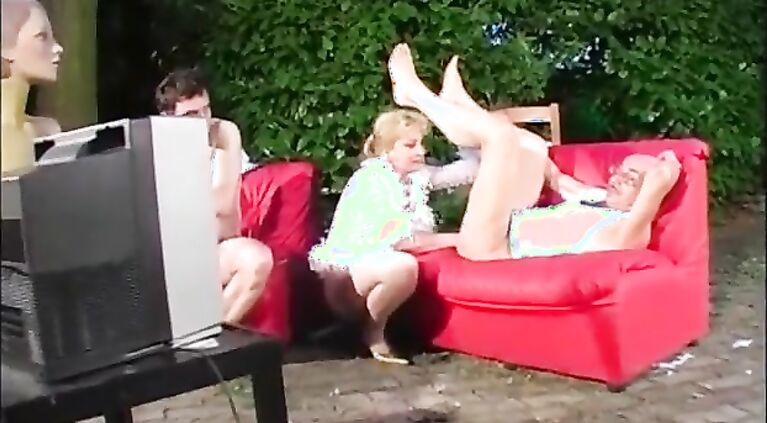 Blonde milf breaks some ass with her fist